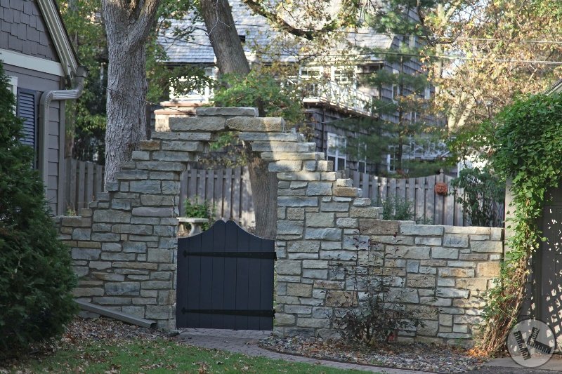 AFTER: Stone Wall with Custom Designed Wood Gate (Edina, MN)