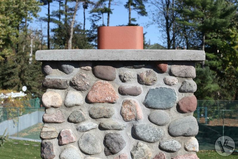 AFTER: Close-up, Fieldstone Chimney Repair with New Flashing (Excelsior, MN)