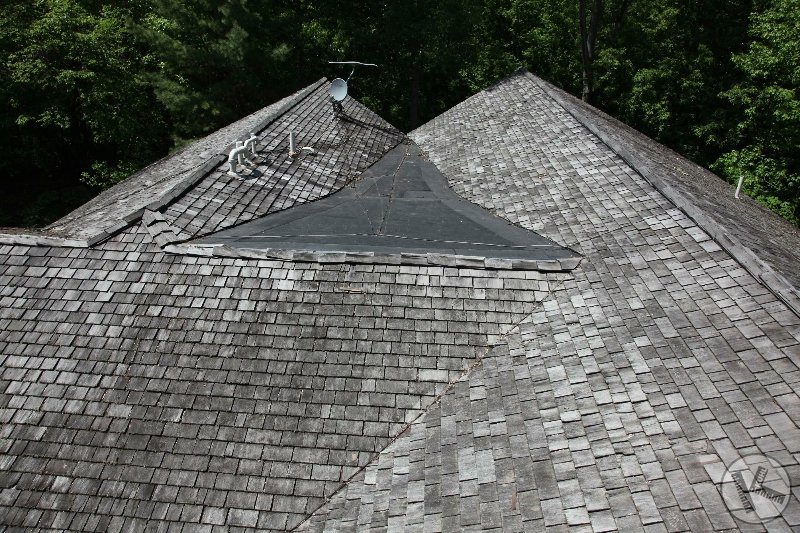 BEFORE: Large Steel Pan in Cedar Roof in Minnetonka
