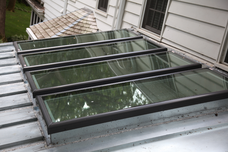 New skylights and metal roof in Edina after skylight replacement