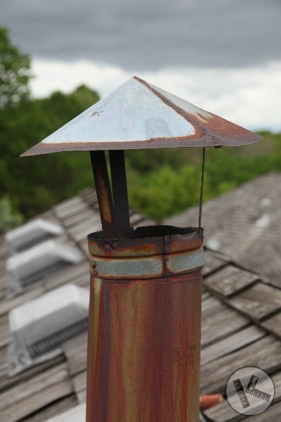 Furnace Flue Cap That Needs Repair on Eden Prairie Cedar Roof