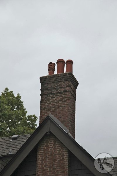 Brick Chimney Rebuilt with New Chimney Pots in Minneapolis