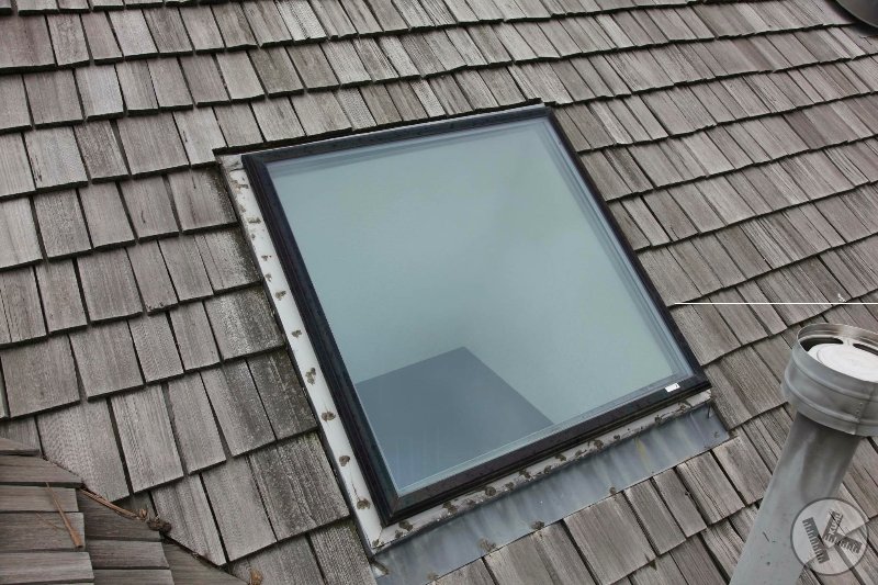 BEFORE: New Flashing Around Skylight on Cedar Roof in Orono