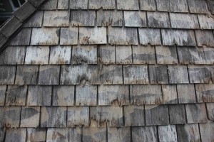 Wood roof in Minneapolis damaged by pressure washer